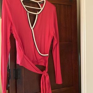 Womens XOXO brand Long Sleeve Top with Circular Back out